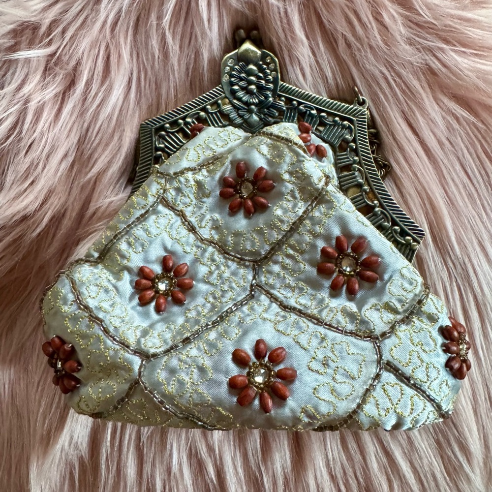 White and Brown Floral Clutch with Ornate Metal Frame